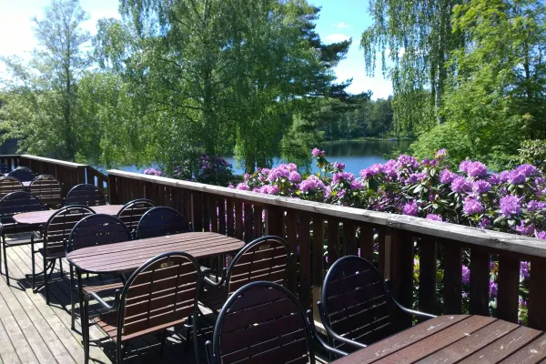 Wooden deck with tables and chairs