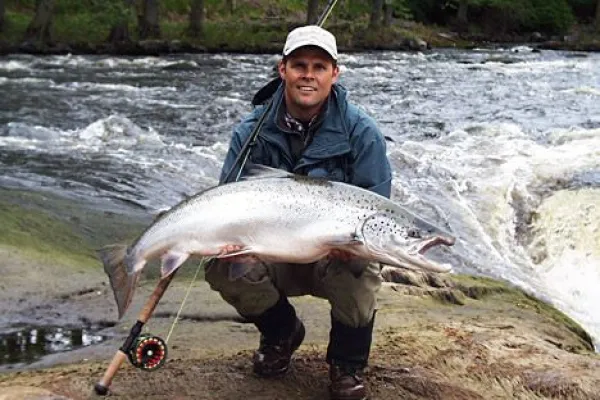 Angler with a salmon